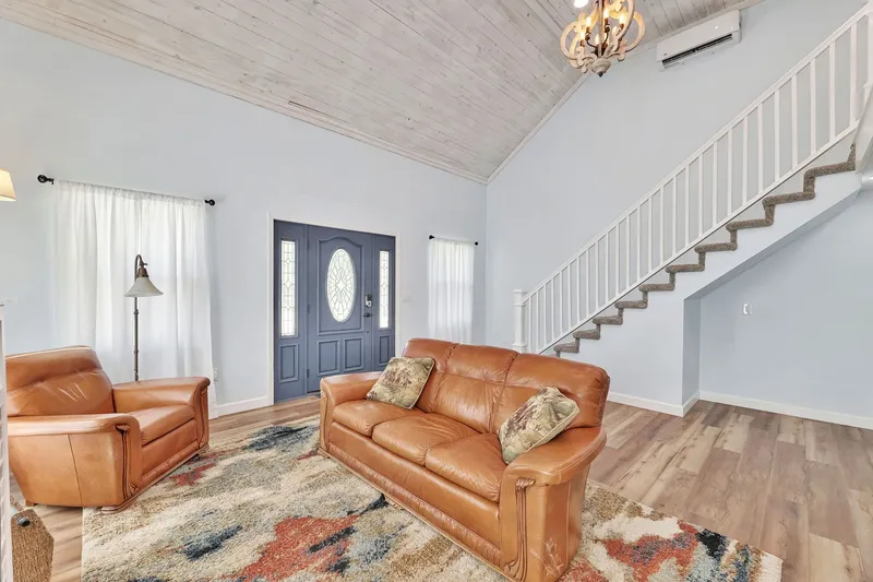Lodge seating area and stairs to the loft
